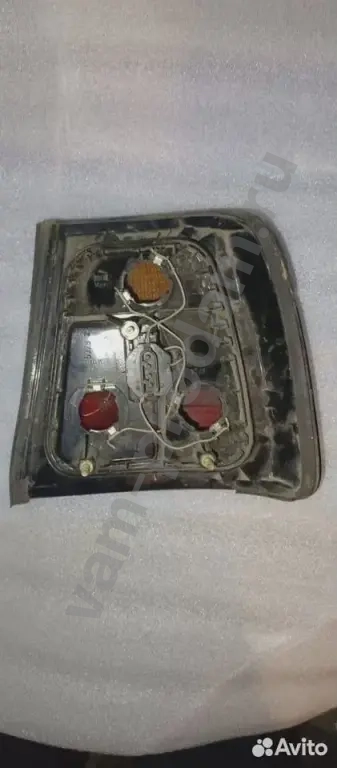 Фонарь Хэлла блэк левый в крыло(наружний) бмв е34