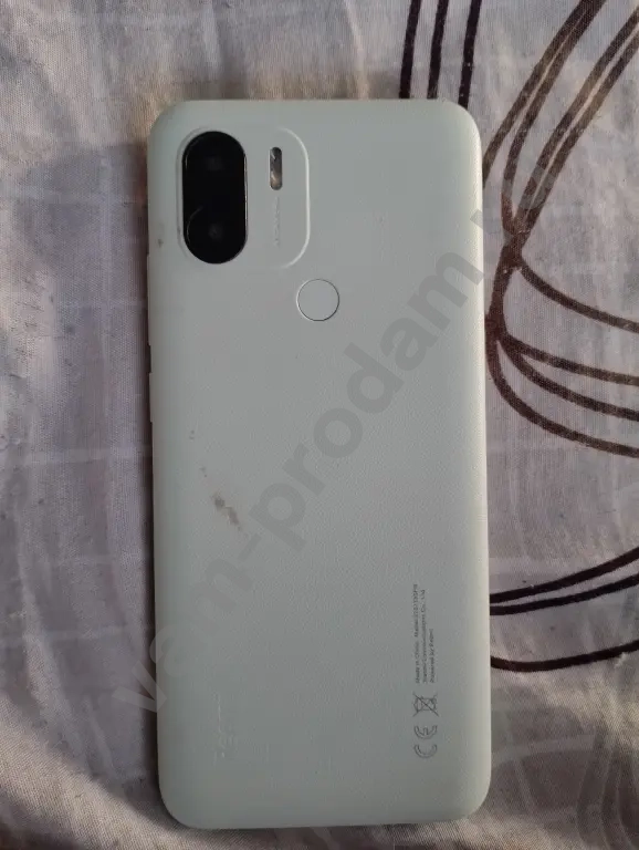 телефон Realmi A1+