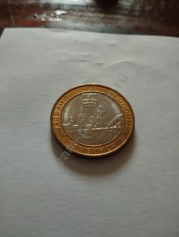 монета