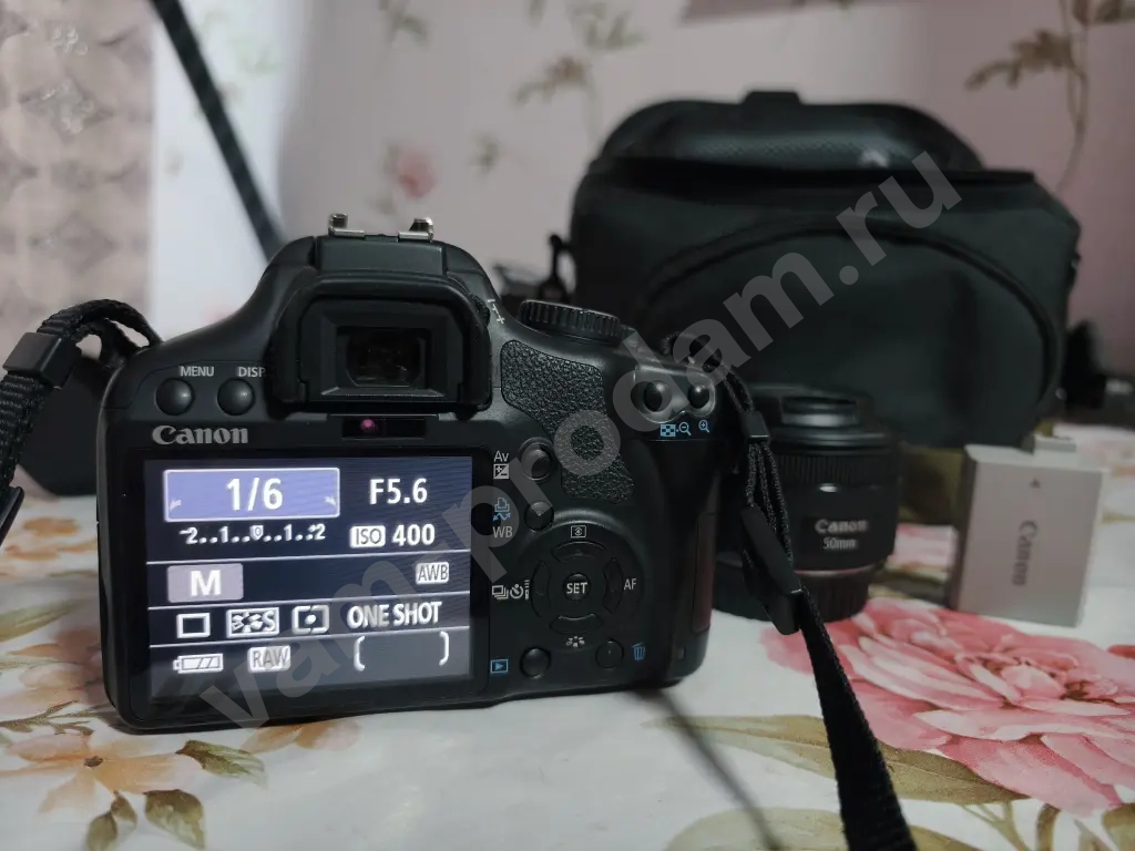 Canon EOS 450D + kit 18-55 + EF 50mm 1.8 STM