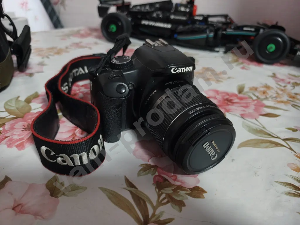 Canon EOS 450D + kit 18-55 + EF 50mm 1.8 STM