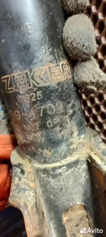 Стойка амортизатора передняя левая Opel