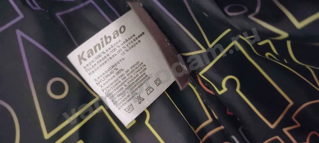 Женский теплый пуховик