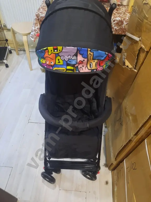 Прогулочная коляска трость