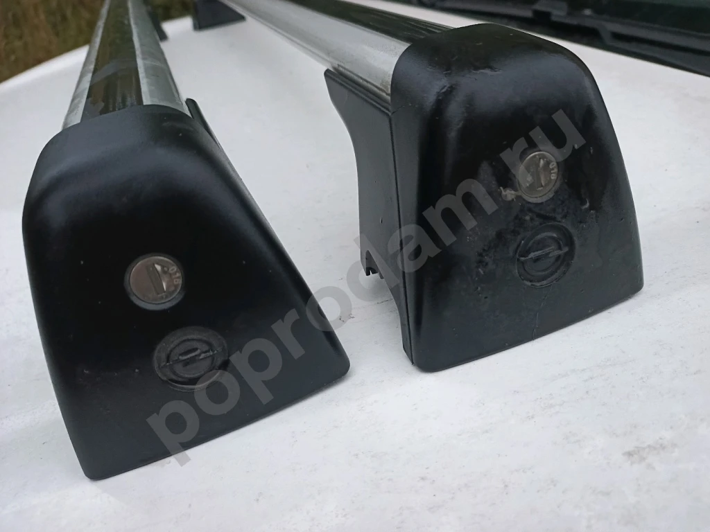 Рейлинги Дуги на багажник , поперечны штатные на крышу на опель оригинальные. Доставка