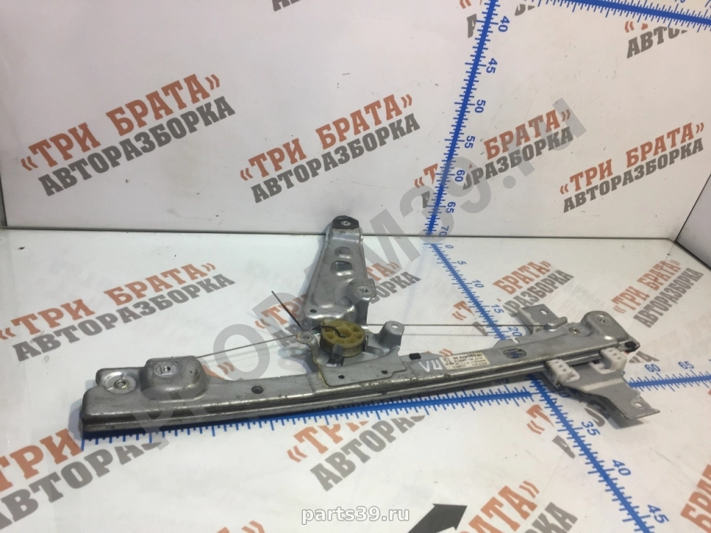 Стеклоподъемник передний левый ( электрический)