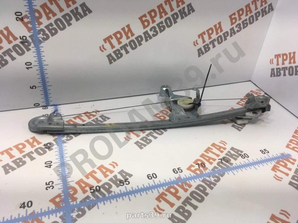 Стеклоподъемник задний левый (электрический)