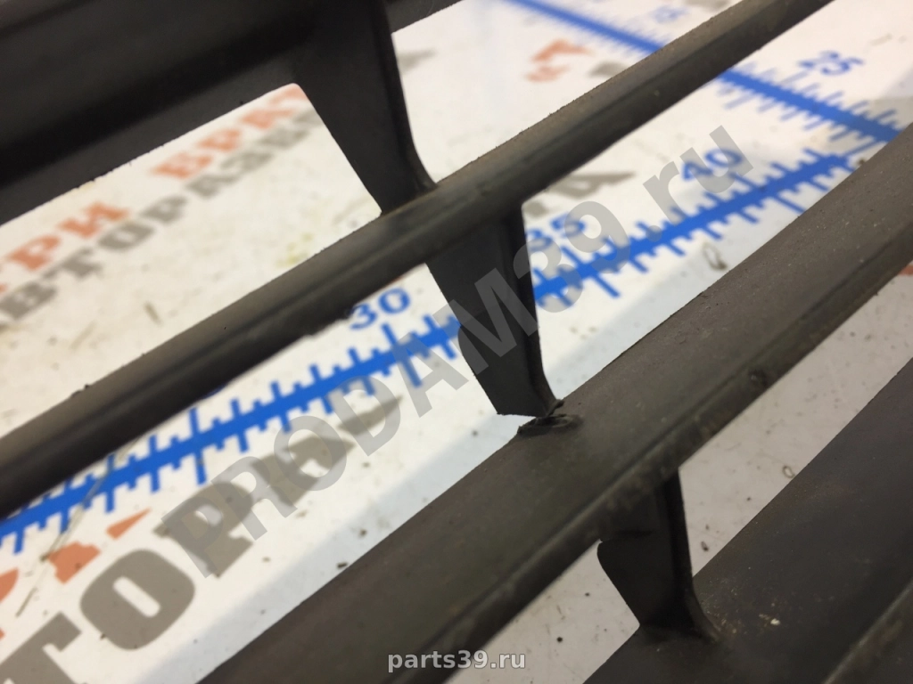 Решетка бампера на Toyota Corolla E150 [рестайлинг] 08-13