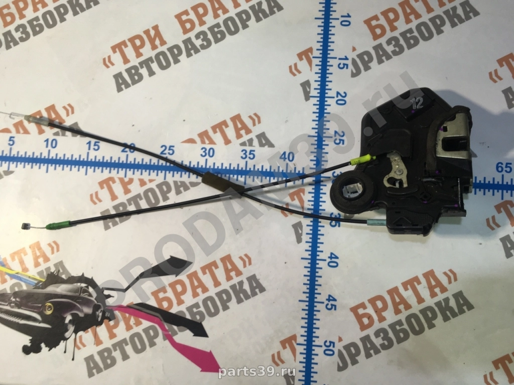 Замок двери задний правый на Toyota Hilux 7 поколение 05-08