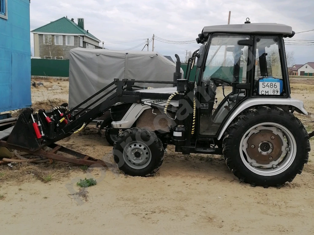 Фронтальный мини погрузчик