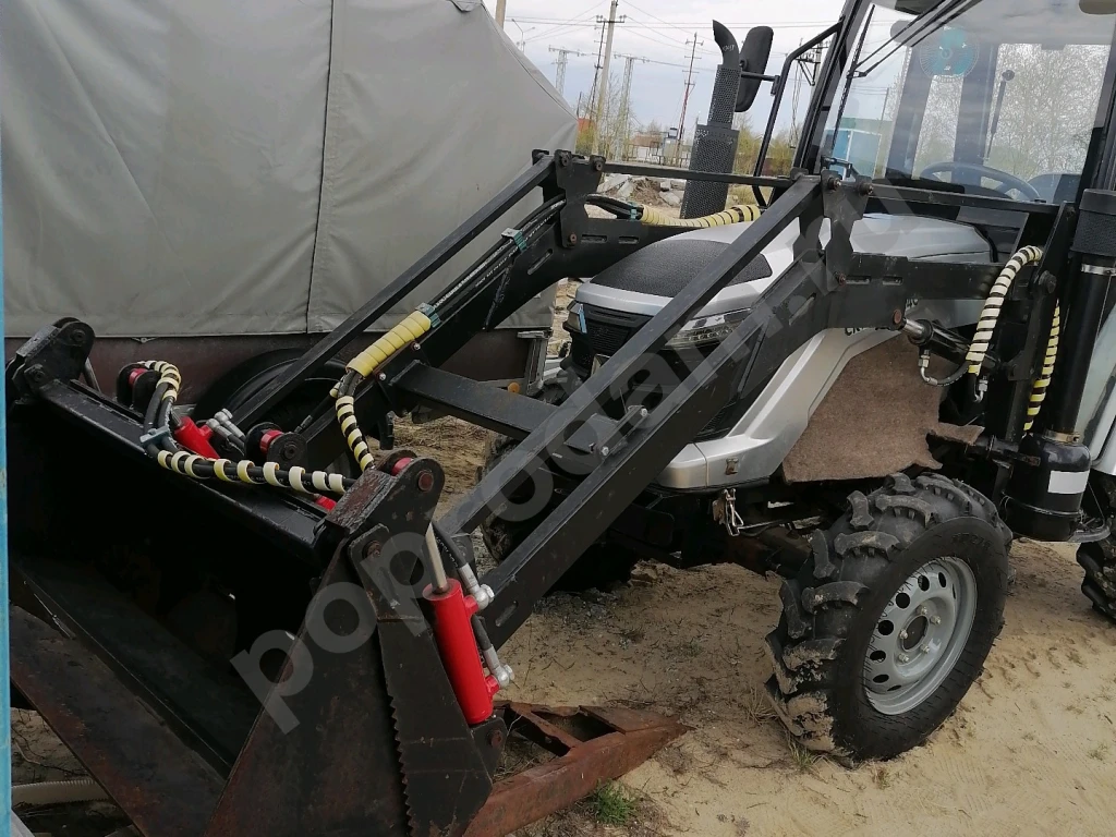 Фронтальный мини погрузчик