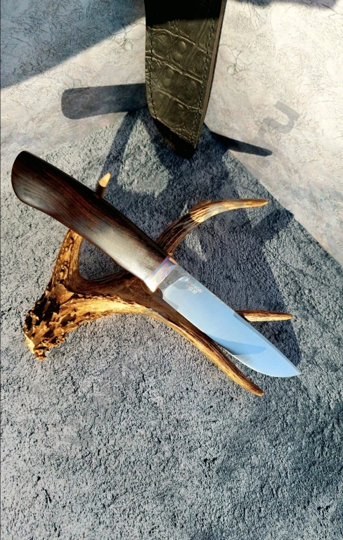 Нож из топовой стали М398