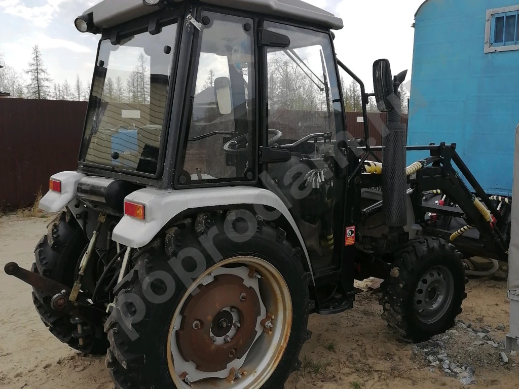 Фронтальный мини погрузчик