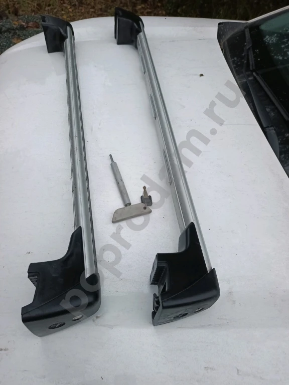 Рейлинги Дуги на багажник , поперечны штатные на крышу на опель оригинальные. Доставка