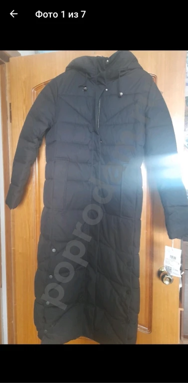 Пуховики зимние черный и голубой.