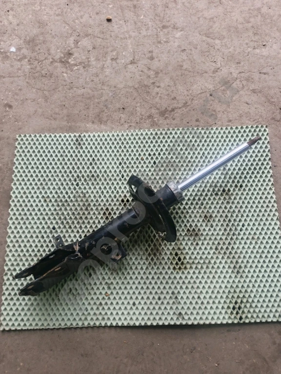 Передний левый амортизатор Додж калибр