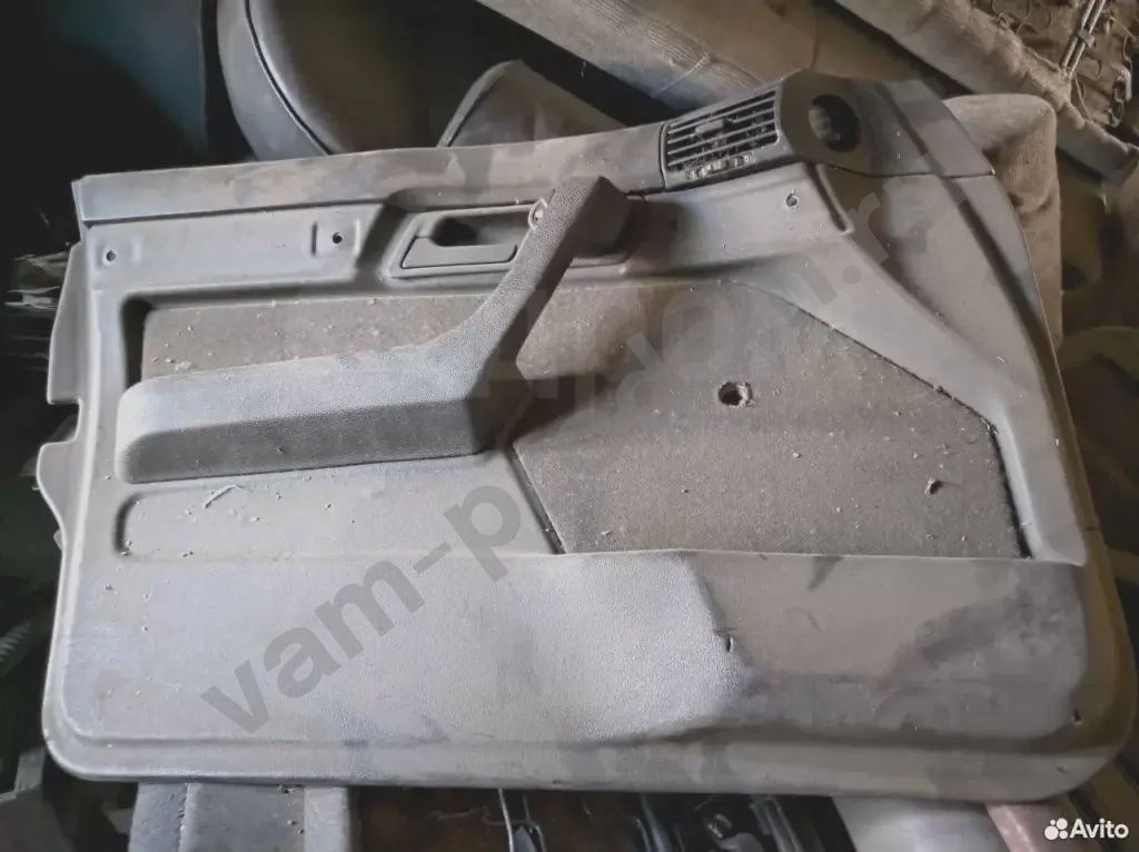 Обшивка двери передней левой бмв е34