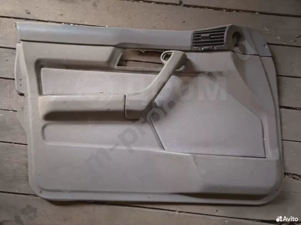 Обшивка двери передней левой бмв е34