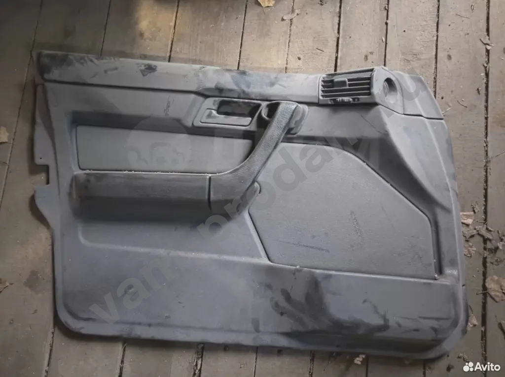 Обшивка двери передней левой бмв е34
