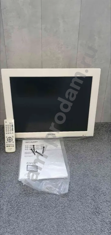 Tелевизop SHARP