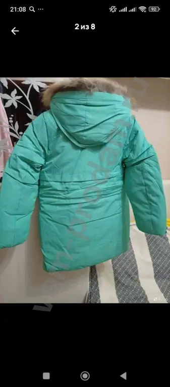 Зимняя куртка на девочку,новая,размер 140