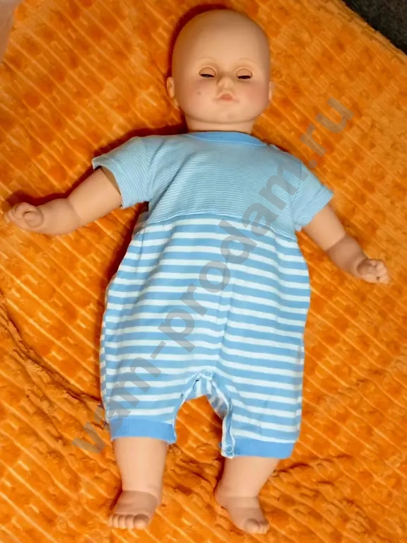 Кукла с одеждой