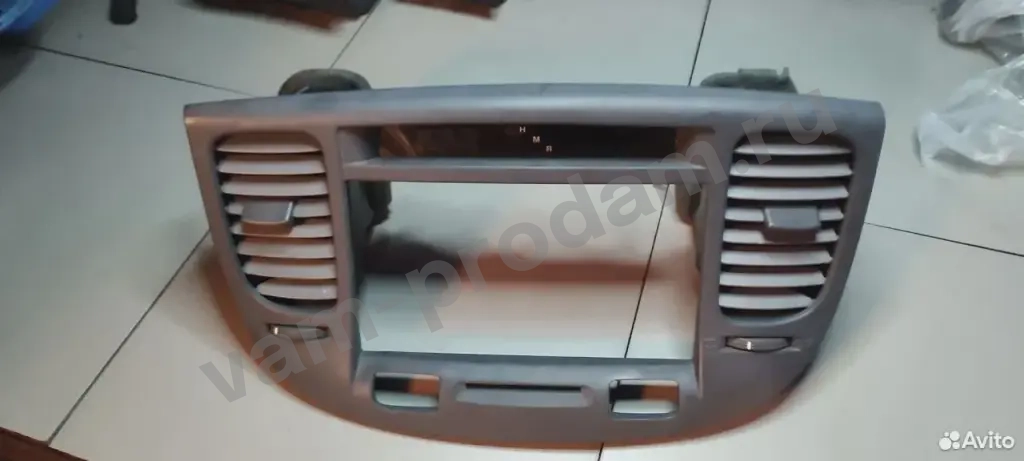 Часы центральной консоли Kia Rio 2