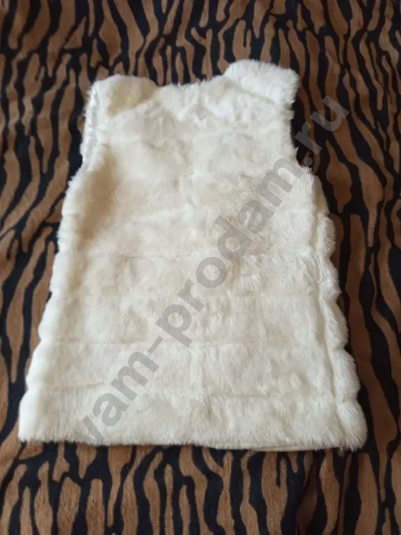 меховой жилет