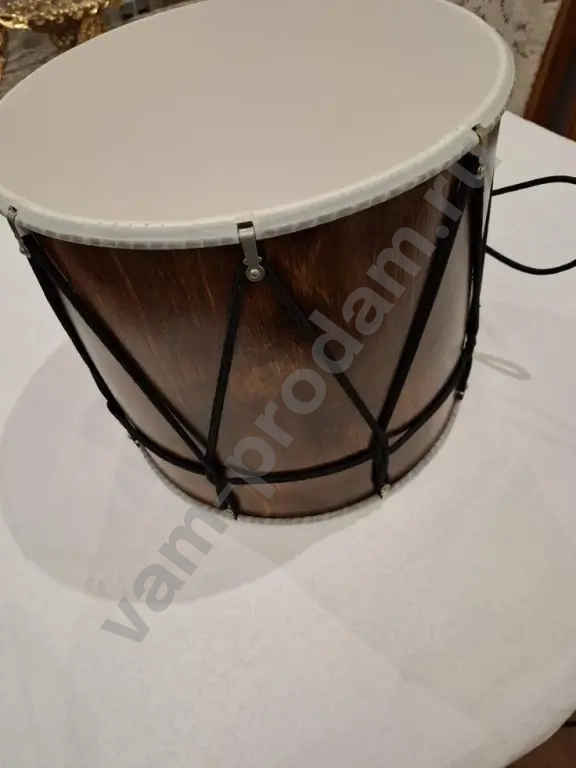 учитель игры на кавказком барабане