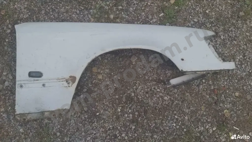 W124 крыло переднее