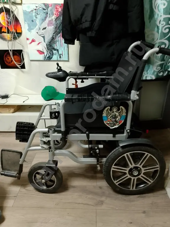 электрическая инвалидная коляска