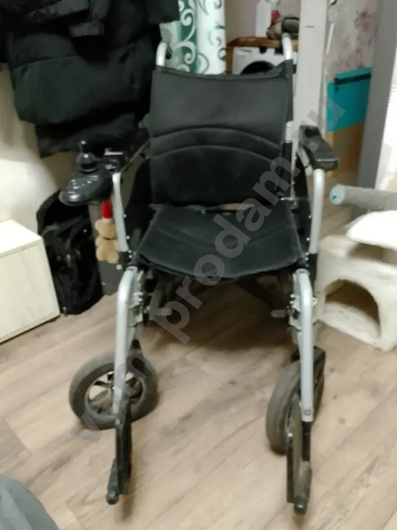 электрическая инвалидная коляска