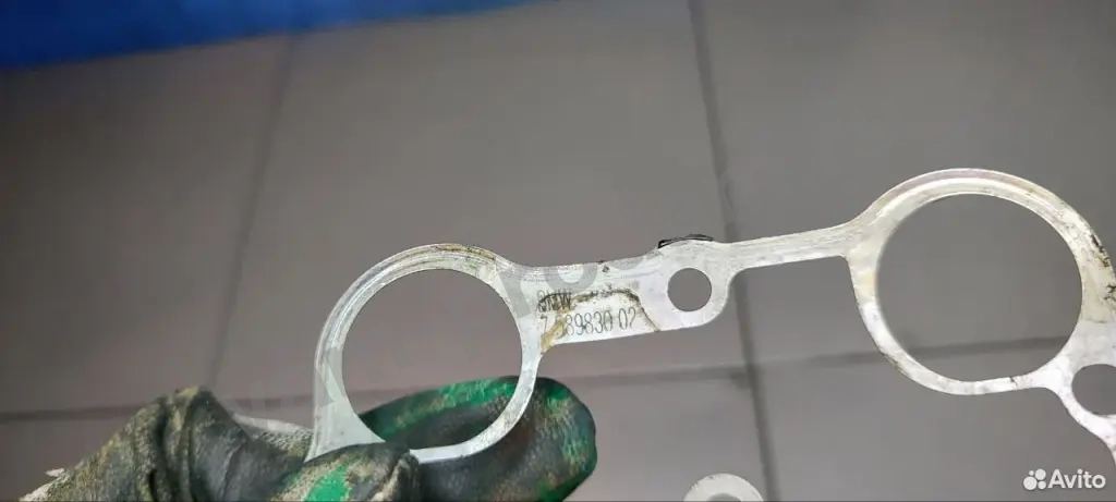 11-25829-SX прокладка свечного канала 11127589830