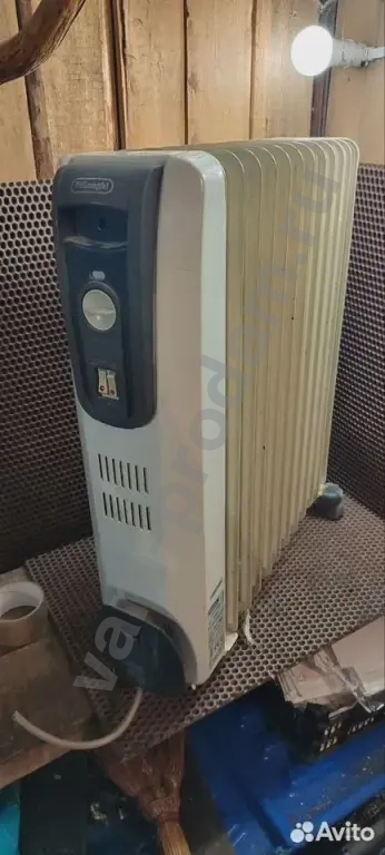 Масляный обогреватель Delonghi