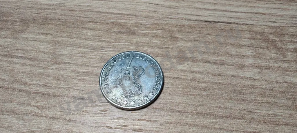 Kao lou electronic CO. жетон