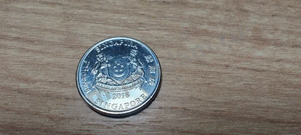 Монета. Сингапур. 20 центов 2016 год.