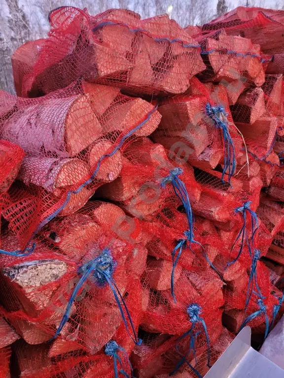 Дрова в сетках вязанки березовые колотые