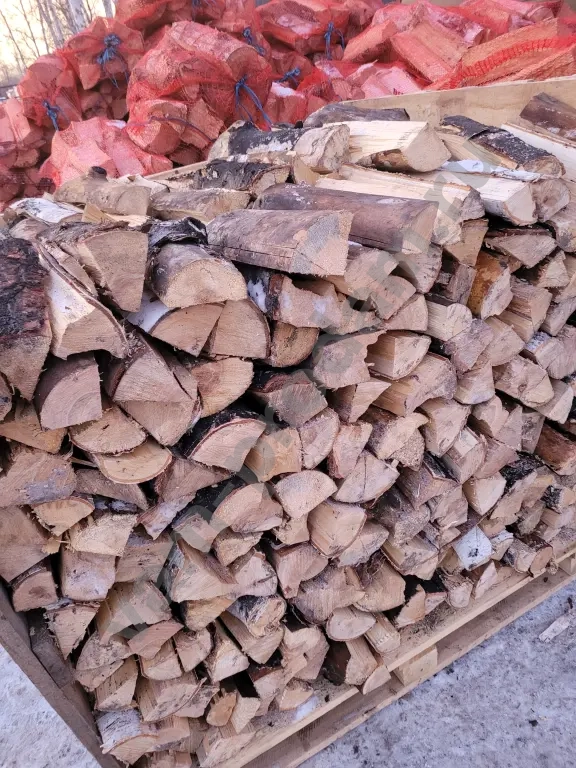 Дрова в сетках вязанки березовые колотые