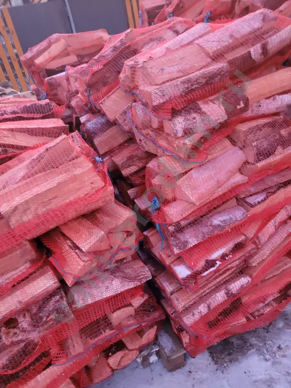 Дрова в сетках вязанки березовые колотые