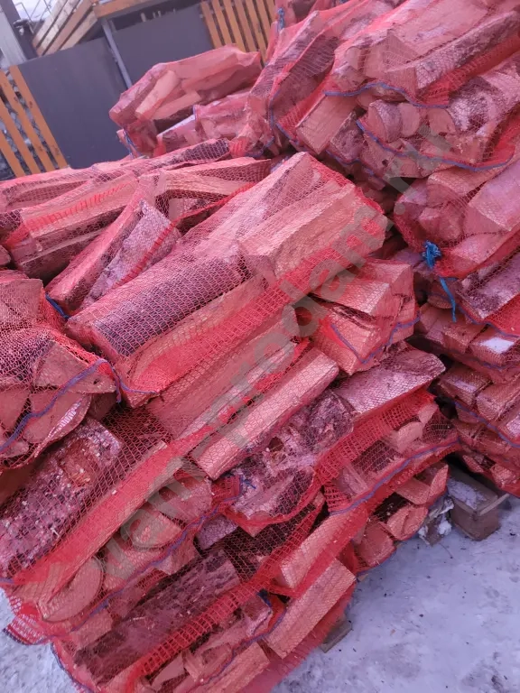 Дрова в сетках вязанки березовые колотые